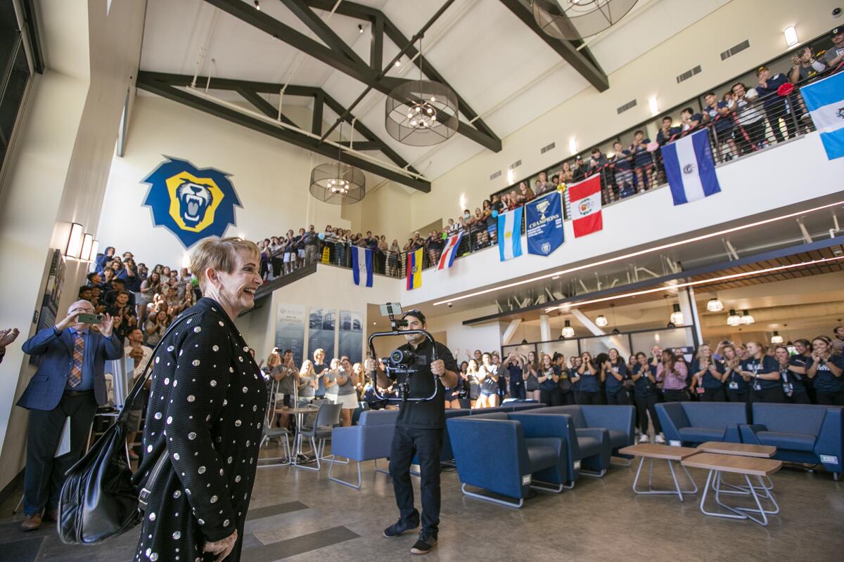 Evelyn Freed is greeted by over 400 student-athletes at the Waugh Student Center on Tuesday.