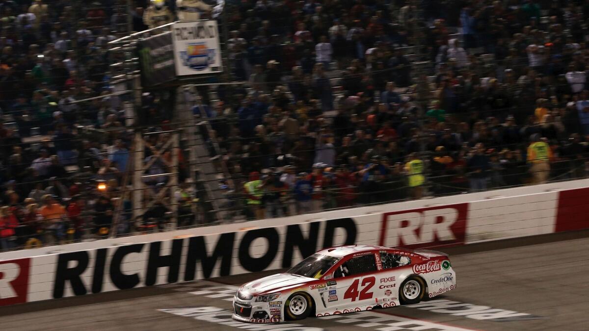 Kyle Larson crosses the finish line to win the NASCAR Cup Series race at Richmond Raceway on Sept. 9.