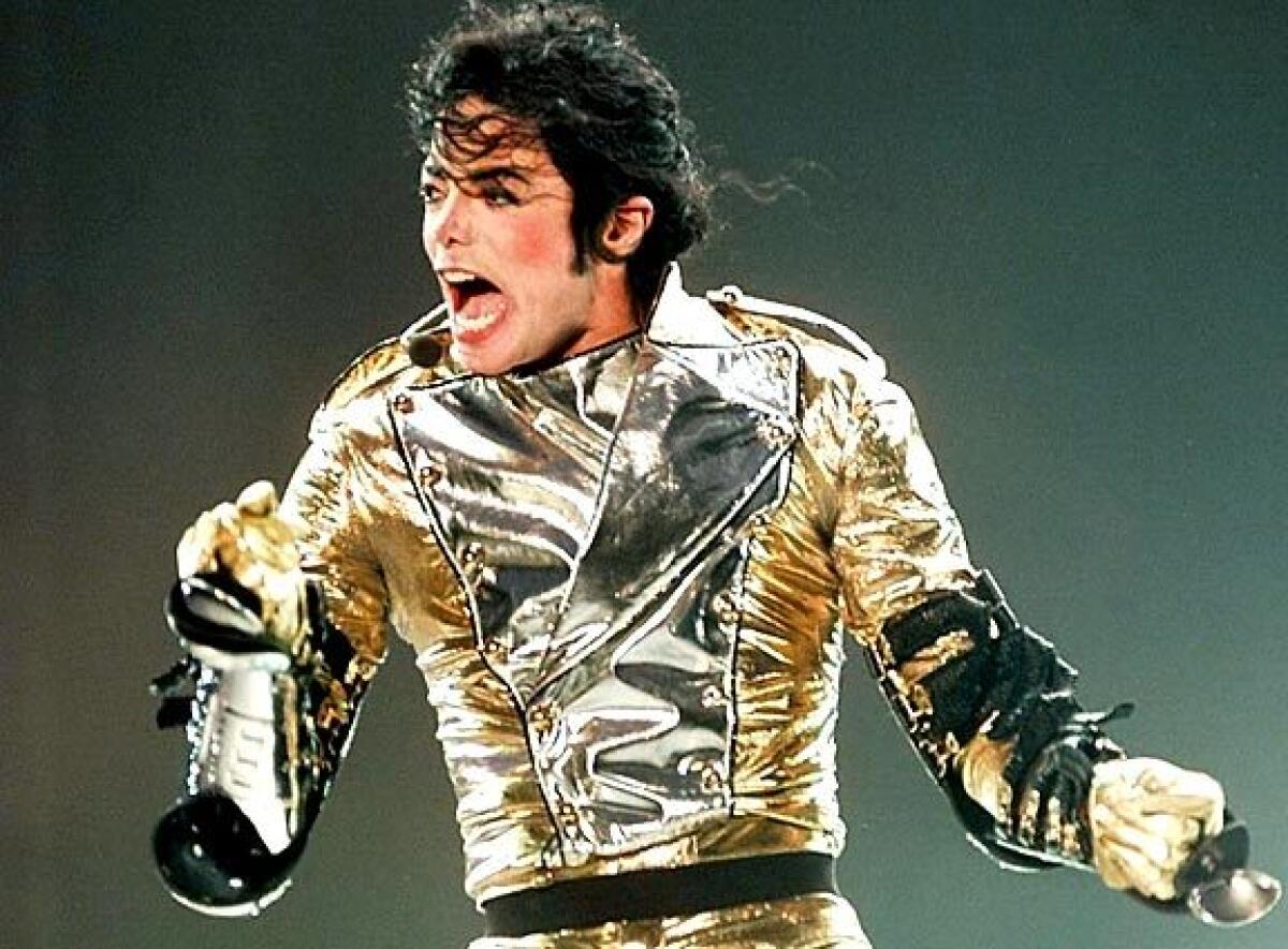 Pop artist Michael Jackson takes the stage at Stade Gerland in Lyon, France, in June 1997.