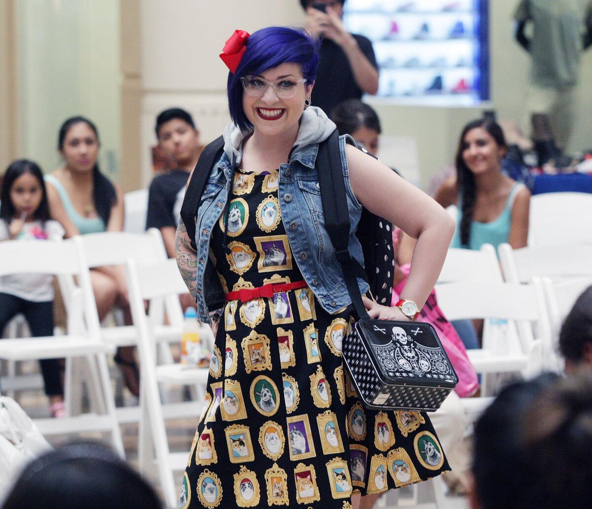 A model wearing Sidecca fashions at the Back to School Fashion Show at the Burbank Town Center on Friday, August 8, 2014.