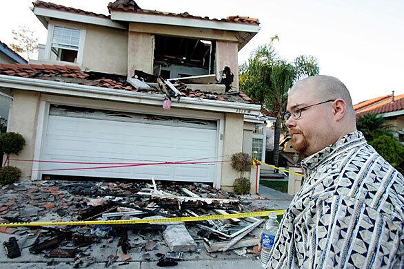 Erik Womack returns to his rented home on Golden Ridge Drive in Corona, where he lives with his wife and five children. Up to date news on L.A. Now Photos: Devastation in Sylmar Photos: Tea Fire in Montecito