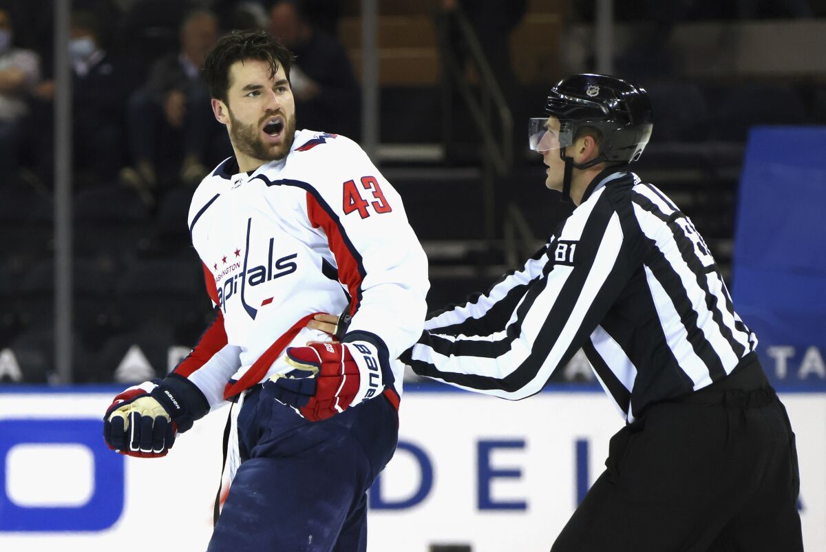 Washington Capitals' Tom Wilson (43) yells at the New York Rangers bench after taking a second-period penalty during an NHL hockey game Monday, May 3, 2021, in New York. (Bruce Bennett/Pool Photo via AP)