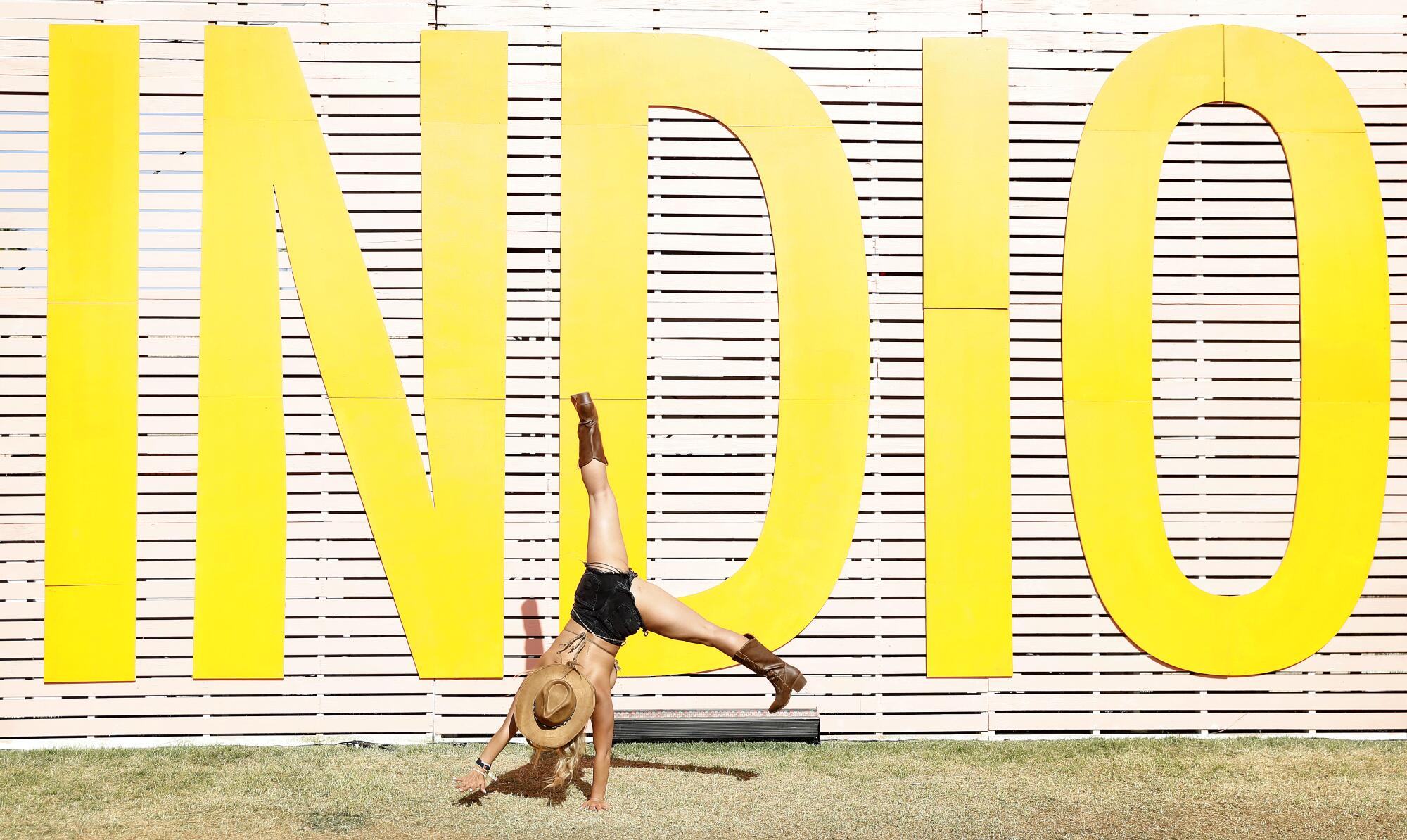 Jennifer Saephanh does a cartwheel on the final day of Coachella.
