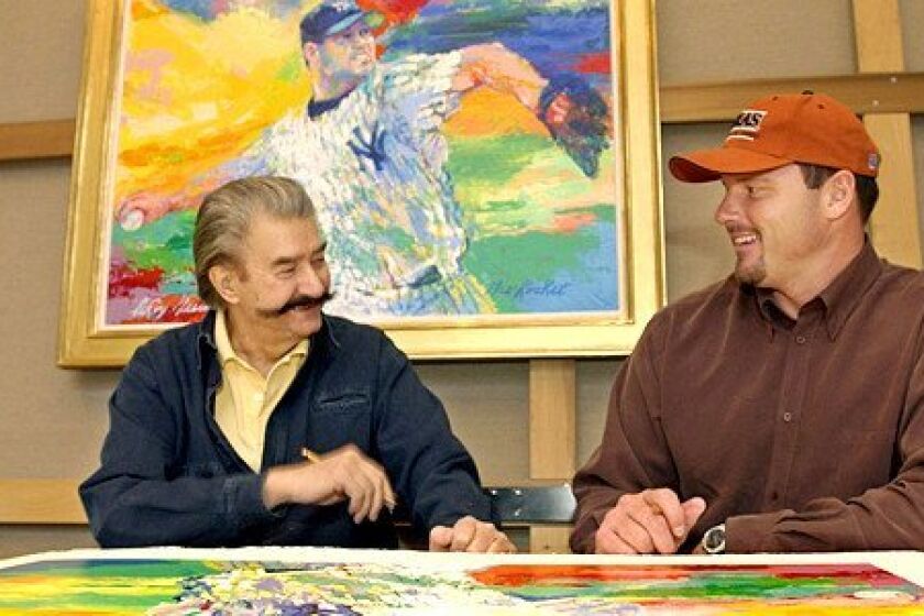 On Nov. 13, 2003, New York Yankees pitcher Roger Clemens, right, talks to artist Leroy Neiman about baseball while signing limited-edition serigraphs based on Neiman's painting "The Rocket," above, of Clemens on the mound in pinstripes, at Neiman's New York studio.