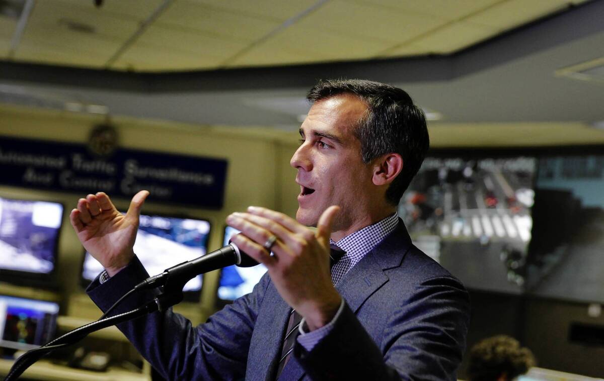 Los Angeles Mayor Eric Garcetti speaks at a news conference in October to unveil a new city website that lets the public see graphs and charts that grade agencies' performance on trash collection, street repairs, ambulance response time and other city services.