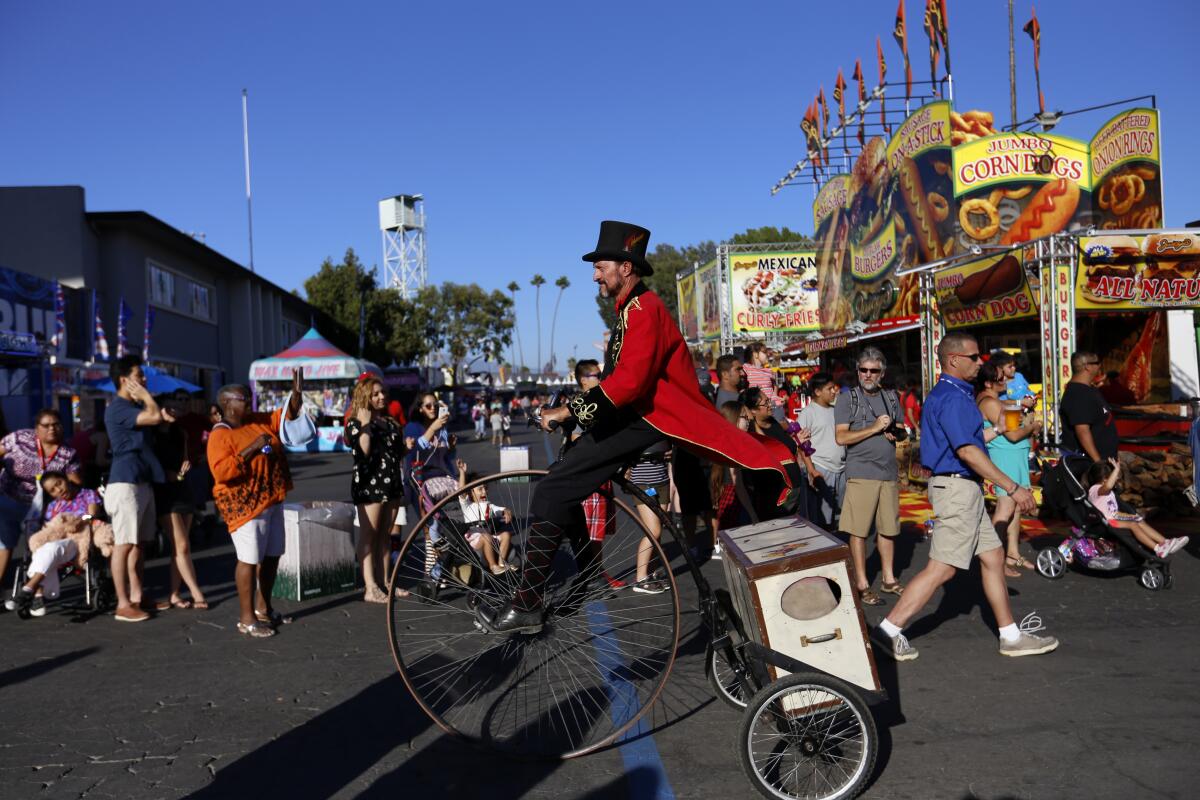 A parade goes though the L.A. County Fair at the Fairplex in Pomona, Calif., on Sept. 2, 2016.