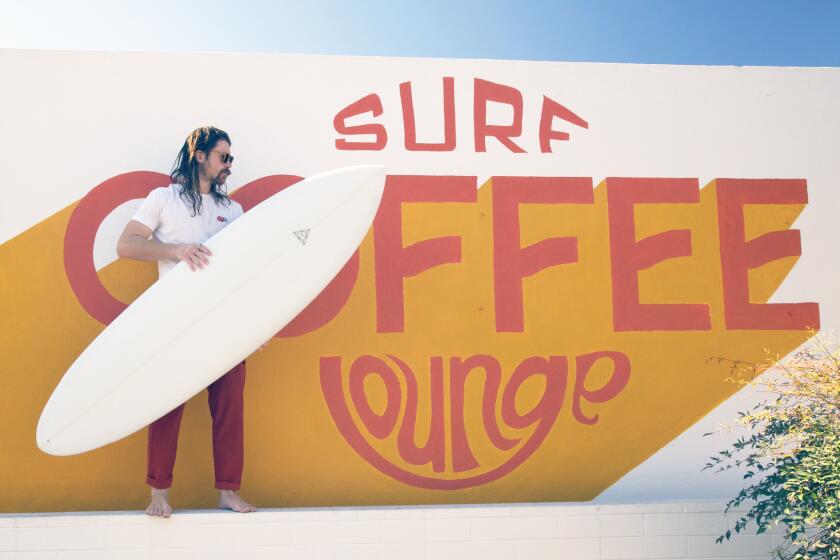 At Surf Lounge in Pacific Beach you can get a cup of coffee and a surf board.