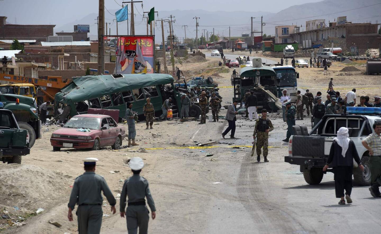 Taliban suicide bombers attack buses filled with police cadets in Kabul