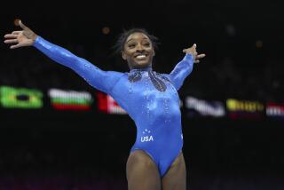 United States' Simone Biles celebrates winning the gold medal after her floor exercise.