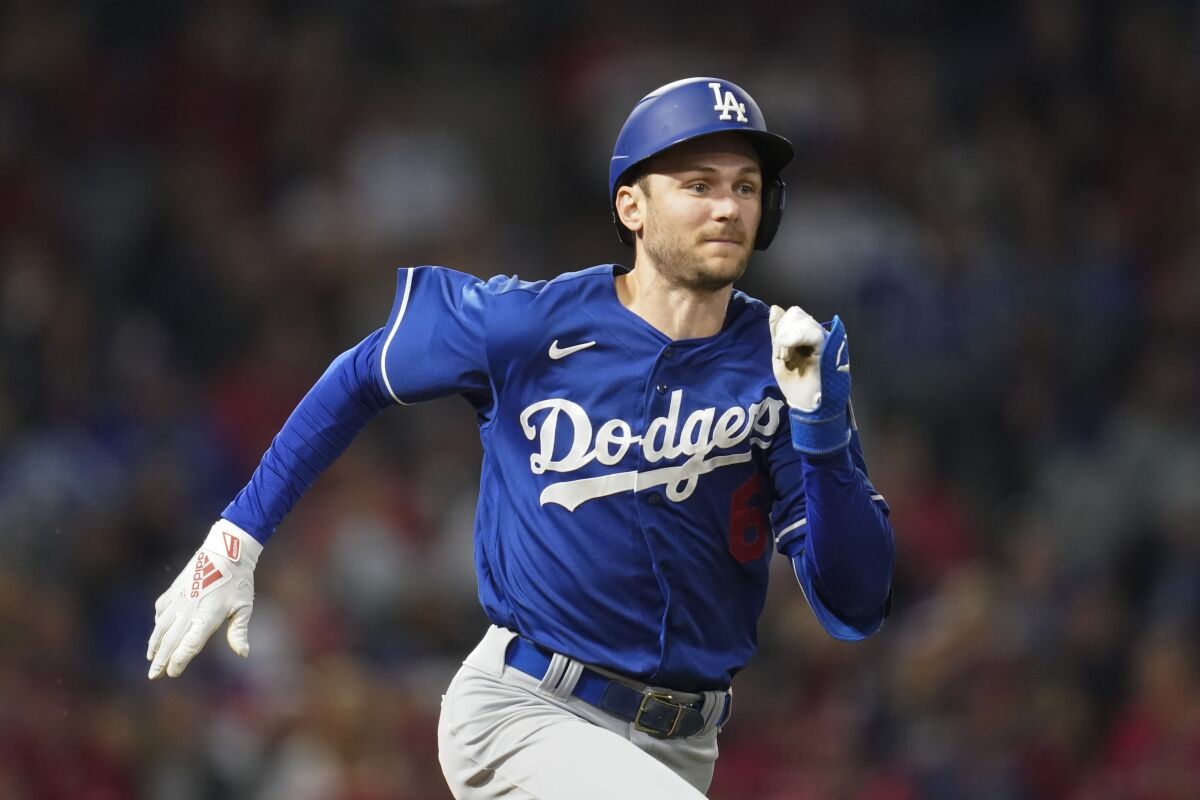 Dodgers shortstop Trea Turner runs to first base during a game against the Angels on Monday.