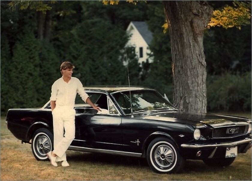 Ford CEO Jim Farley, as a teenager, with his first ride, a 1965 Mustang