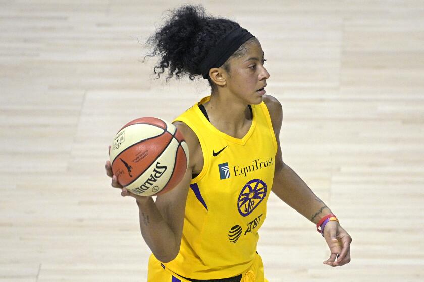 Los Angeles Sparks forward Candace Parker (3) passes the ball during the second half.