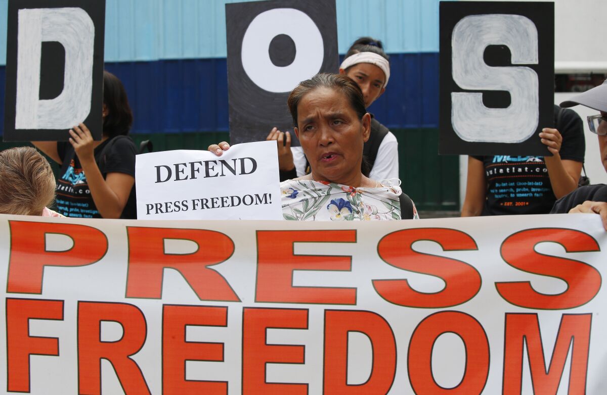 FIn this May 3, 2019, file photo, protesters rally outside the armed forces headquarters to mark World Press Freedom Day.