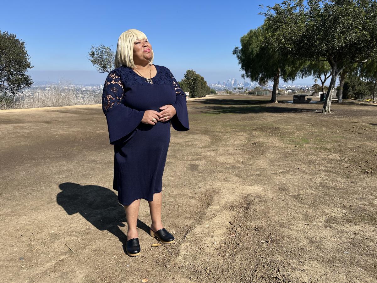 Georgia Horton, a participant in Compton Pledge, standing in a field.