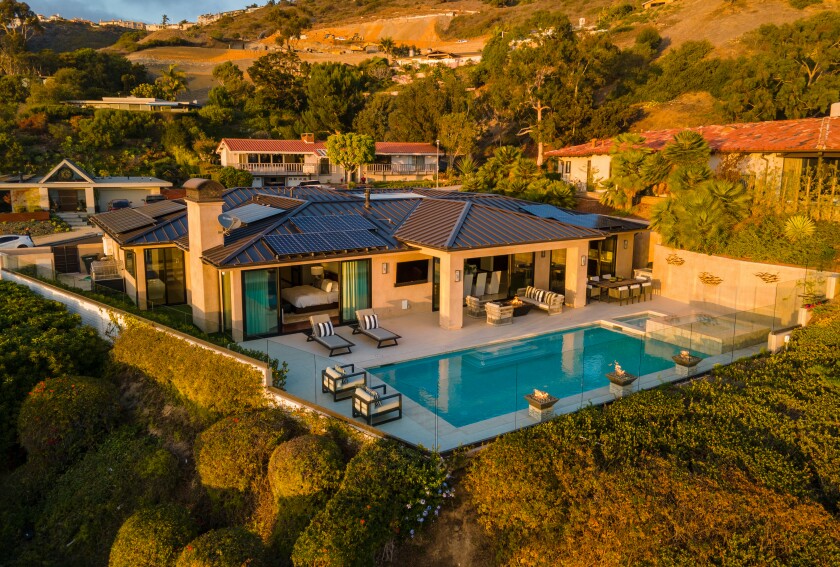 Perched in Monarch Bay Terrace, the single-story home opens to a spacious patio overlooking the ocean.
