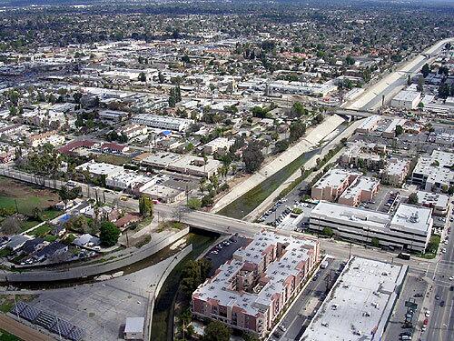 Bell Creek, left, and Calabasas Creek merge to form the Los Angeles River near Warner Center in the western San Fernando Valley. The river flows the width of the valley, hangs a right toward downtown and then spills into the Pacific near the Port of Long Beach, about 51 miles after it begins.
