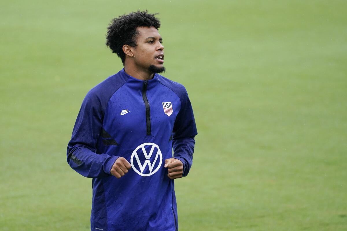 McKennie doesn't dress for qualifier after violating rules - The
