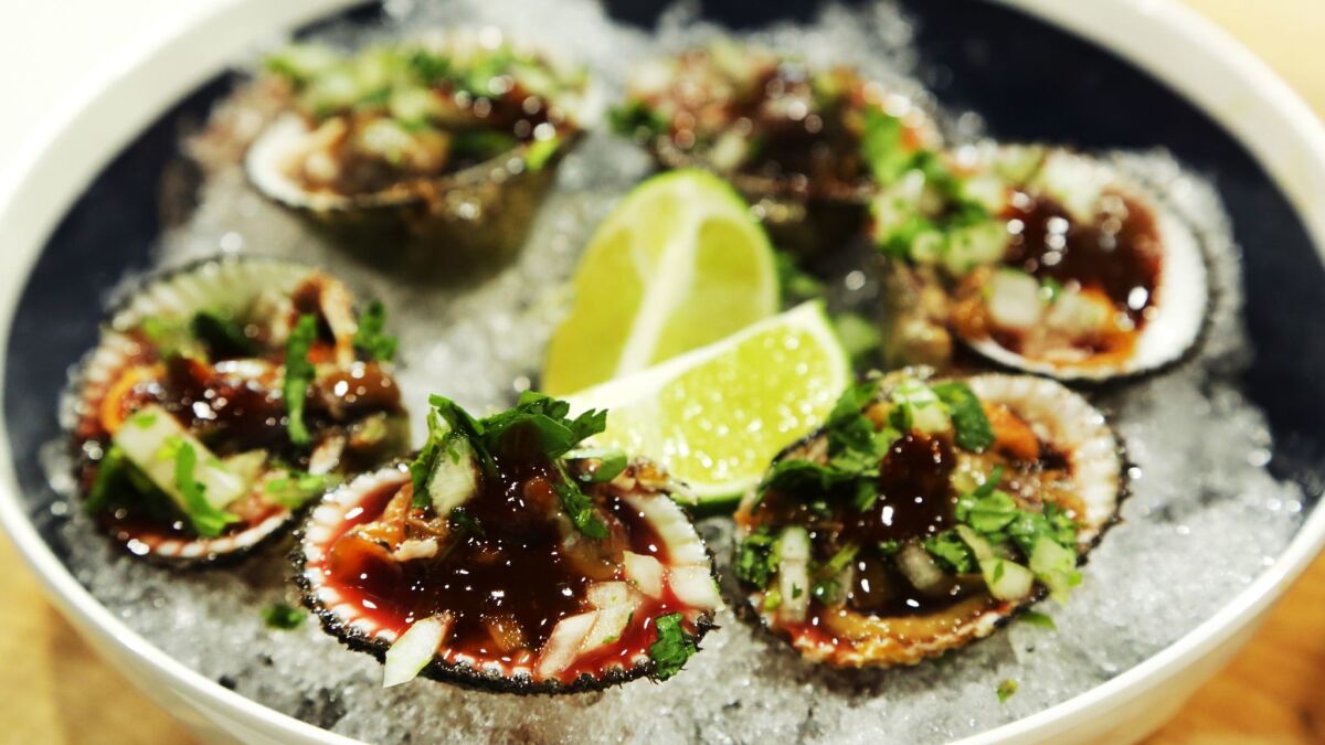 Blood clams are on chef Gilberto Cetina's Yucatan seafood menu at Holbox in the Mercado La Paloma in south Los Angeles.