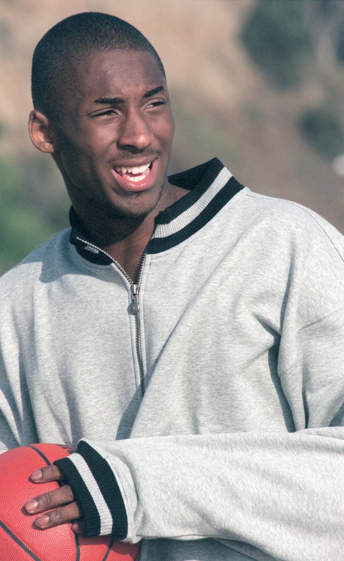 Lakers rookie Kobe Bryant takes part in an ad shoot for Adidas at Will Rogers State Beach.