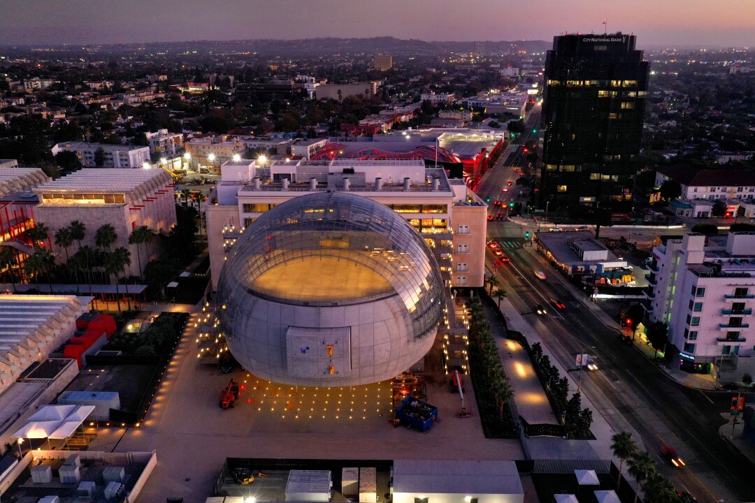 A drone photo of the museum's glass-topped sphere, which has a viewing terrace on top and a 1,000-seat theater inside.