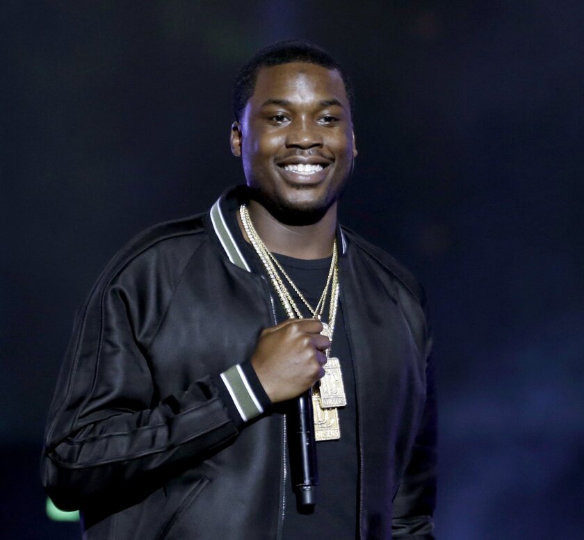 FILE - In this Sept. 28, 2013, file photo, Meek Mill performs at the BET Hip Hop Awards, in Atlanta.
