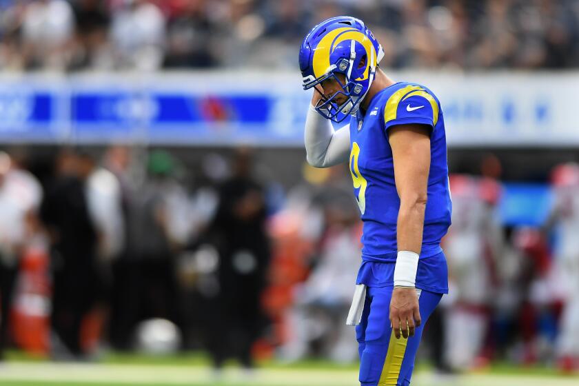 Inglewood, CA. October 3, 2021: Rams quarterback Matthew Stafford walks off the field after throwing an incomplete pass on third down against the Cardinals in the third quarter at SoFi Stadium Sunday. (Wally Skalij/Los Angeles Times)