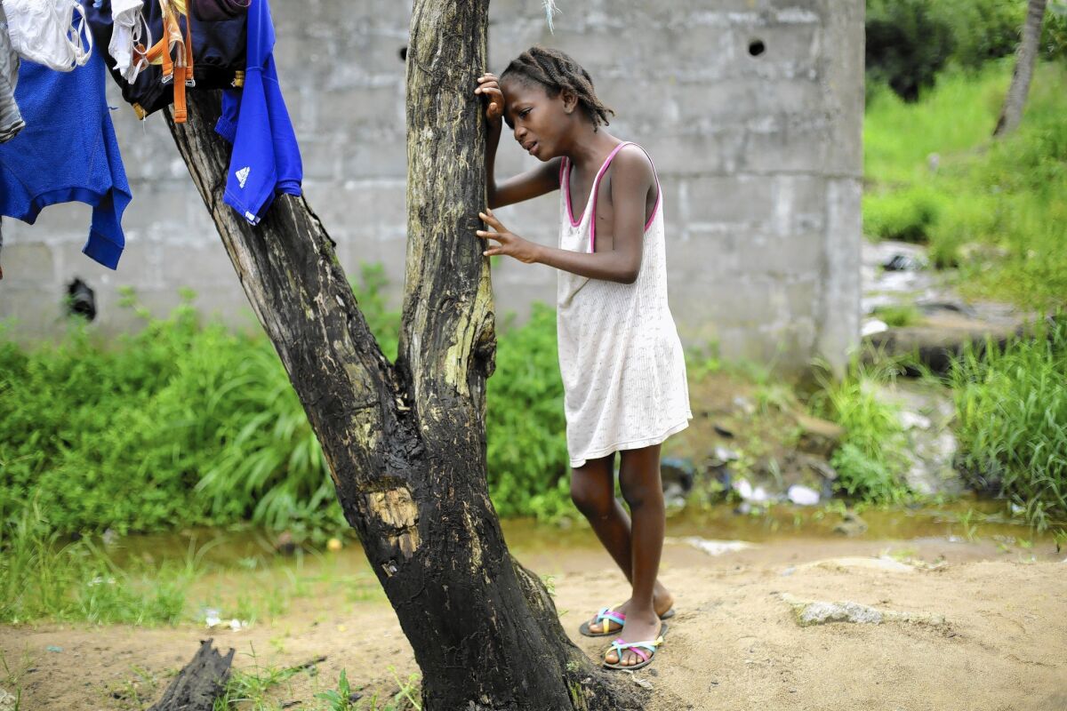 Mercy Kennedy, 9, in Monrovia, Liberia, whose mother died of Ebola.