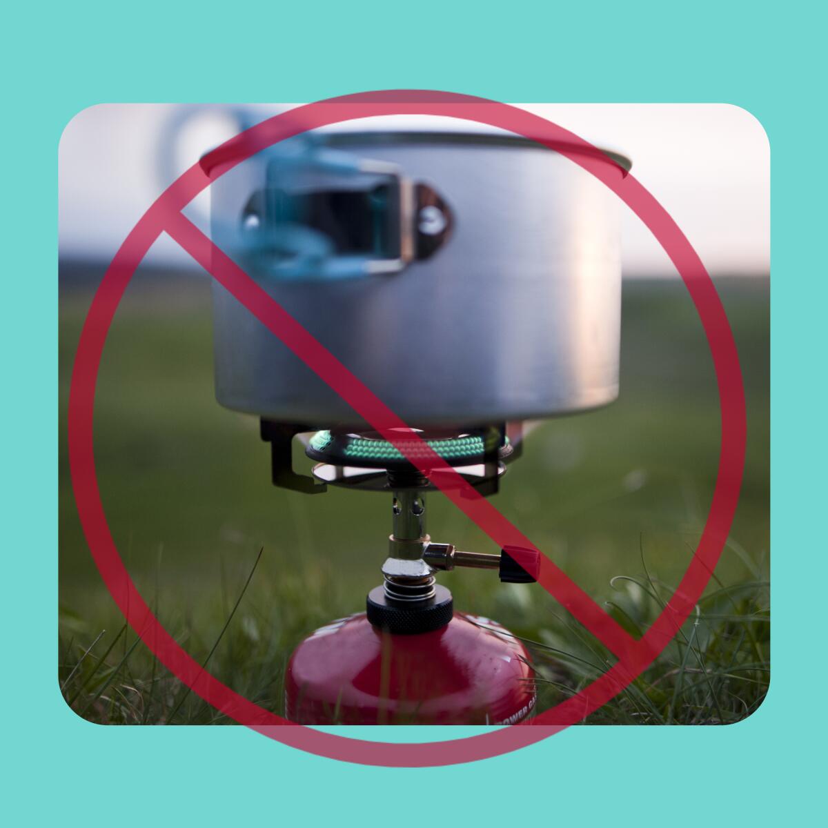 A camping stove with a red warning sign superimposed on it.