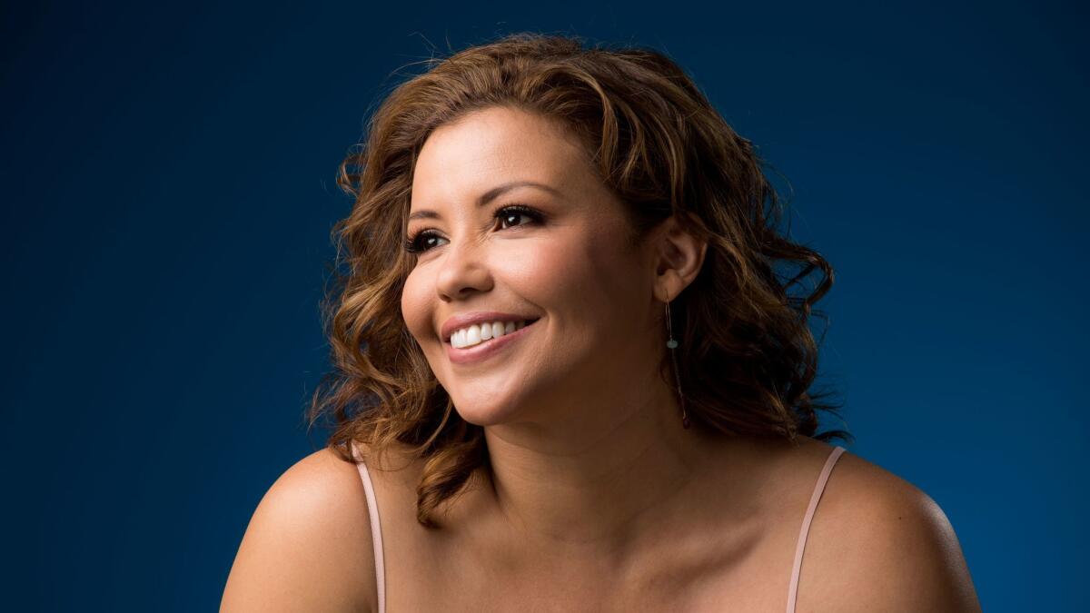 Actress Justina Machado stars in Norman Lear's reboot of "One Day at a Time." The revamped version is set in Echo Park and centers on three generations of a Cuban American family.