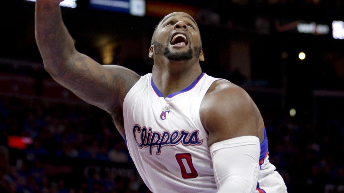 Clippers forward Glen Davis reacts to a play during the Clippers' win over the Houston Rockets in Game 3 of the Western Conference semifinals on Friday.