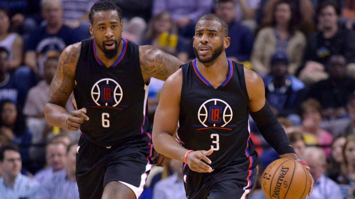 Clippers guard Chris Paul (3), dribbling in front of center DeAndre Jordan, has made 51.9% of his three-point shots since the All-Star break.