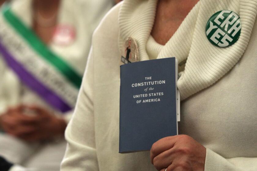 WASHINGTON, DC - APRIL 30: An activist holds a copy of the U.S. Constitution during a news conference on womens rights April 30, 2019 on Capitol Hill in Washington, DC. Activists and Congressional Democrats joined Rep. Maloney in the news conference to call for ratification of the Equal Rights Amendment (ERA). (Photo by Alex Wong/Getty Images) ** OUTS - ELSENT, FPG, CM - OUTS * NM, PH, VA if sourced by CT, LA or MoD **