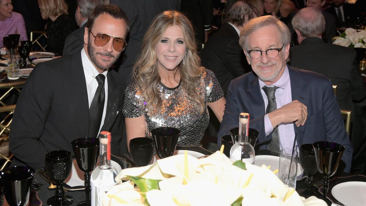 Tom Ford, left, Rita Wilson and Steven Spielberg attend WCRF's An Unforgettable Evening, presented by Saks Fifth Avenue.