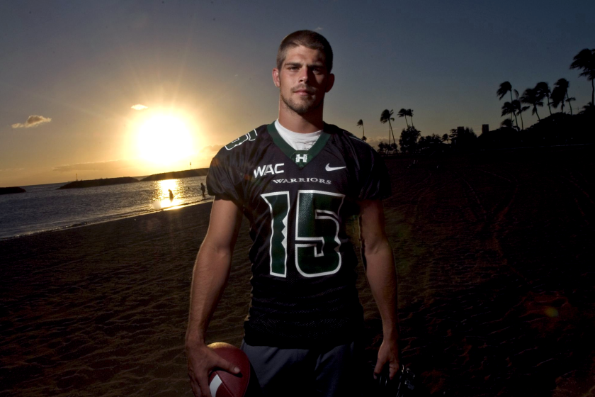 Quarterback Colt Brennan or the University of Hawaii Warriors poses for a photo on Waikiki Beach on August 16, 2007.