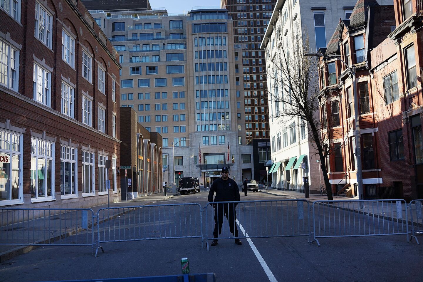 A police officer stands near the scene of Monday's twin bombings at the Boston Marathon.