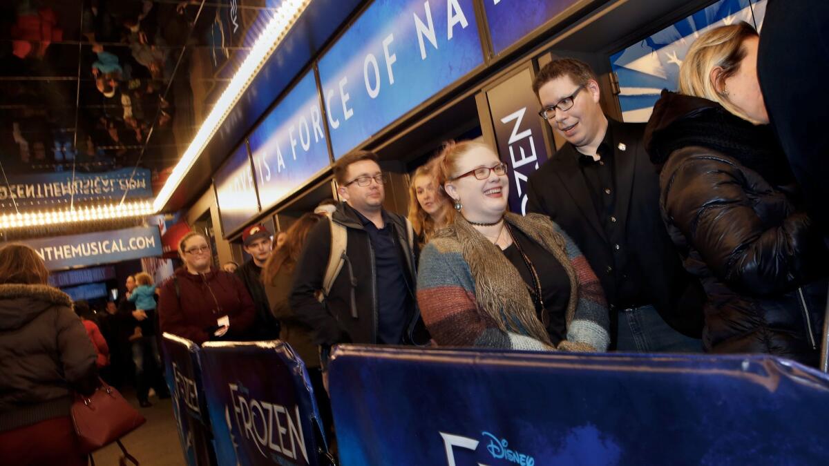 Fans line up for the first preview of the musical "Frozen" at the St. James Theatre in New York.
