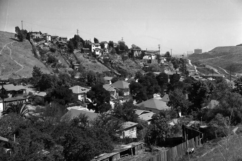April 1951: Chavez Ravine, looking down Bishops Road, before removal of homes and 1800 families to make way for the Elysian Park Heights housing project. This photo was published in the April 20, 1951 Los Angeles Times. The housing project was later cancelled and the land used for Dodger Stadium.