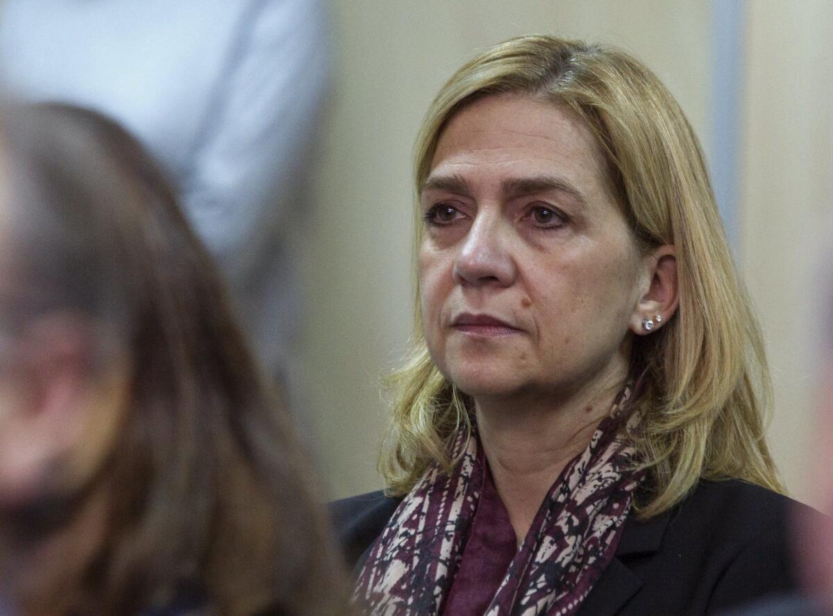 Spain's Princess Cristina listens to the proceedings during a corruption trial in a makeshift courtroom in Palma, capital of Mallorca, on Monday.