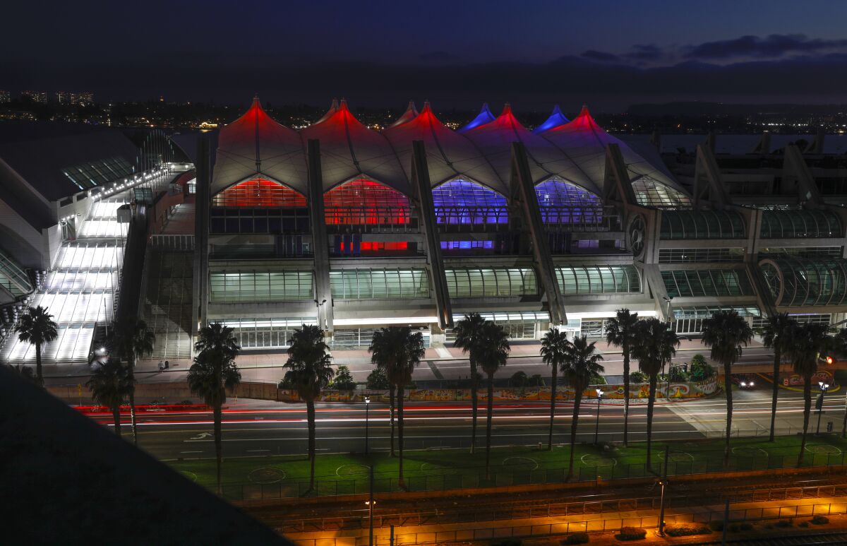 The San Diego Convention Center bathed in red, white and blue lights in honor of the Olympics.