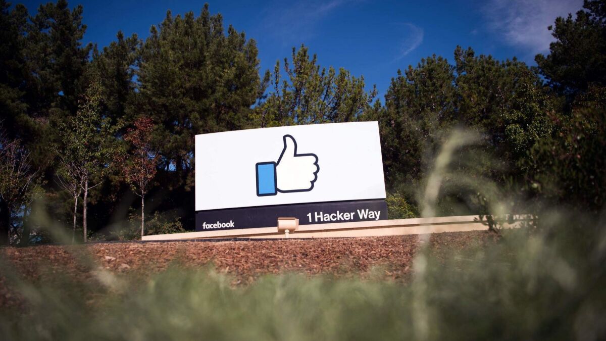The Facebook sign and logo as seen in Menlo Park, Calif. on November 4, 2016.