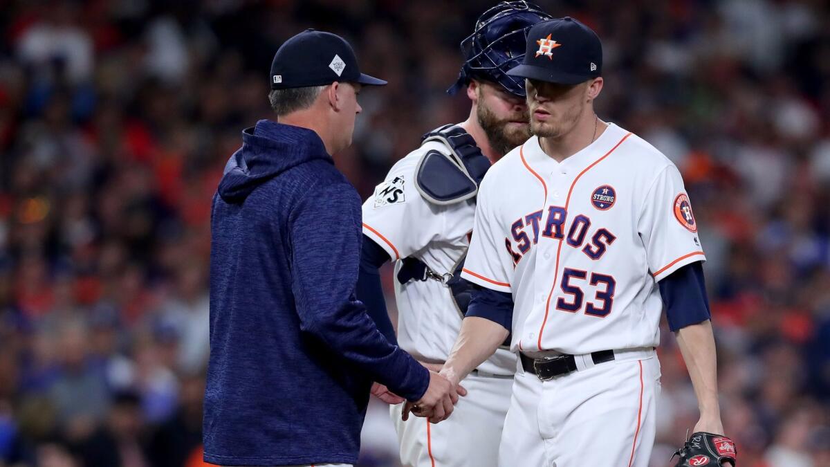 Ken Giles walks off the mound in Game 4