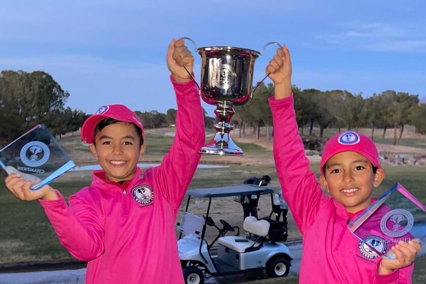 Team San Diego's Kai Molina (a fifth grader at Ocean Air) and Lucas Pollack won the boys 10 division championship.