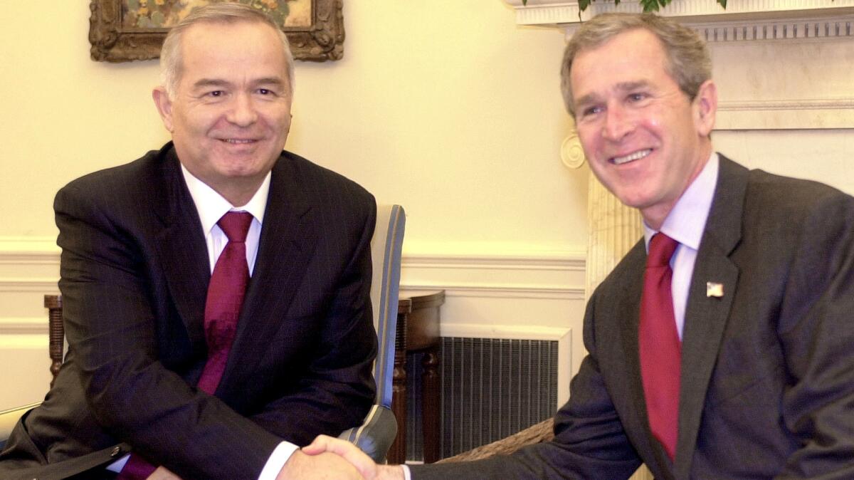 President George W. Bush meets with Uzbek President Islam Karimov at the White House in March 2002.