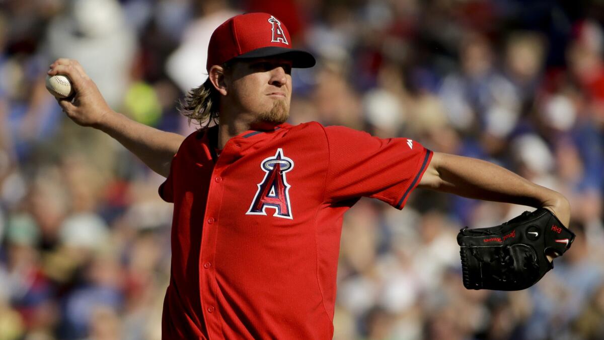 Angels starter Jered Weaver delivers a pitch during an exhibition game against the Chicago Cubs on March 26.
