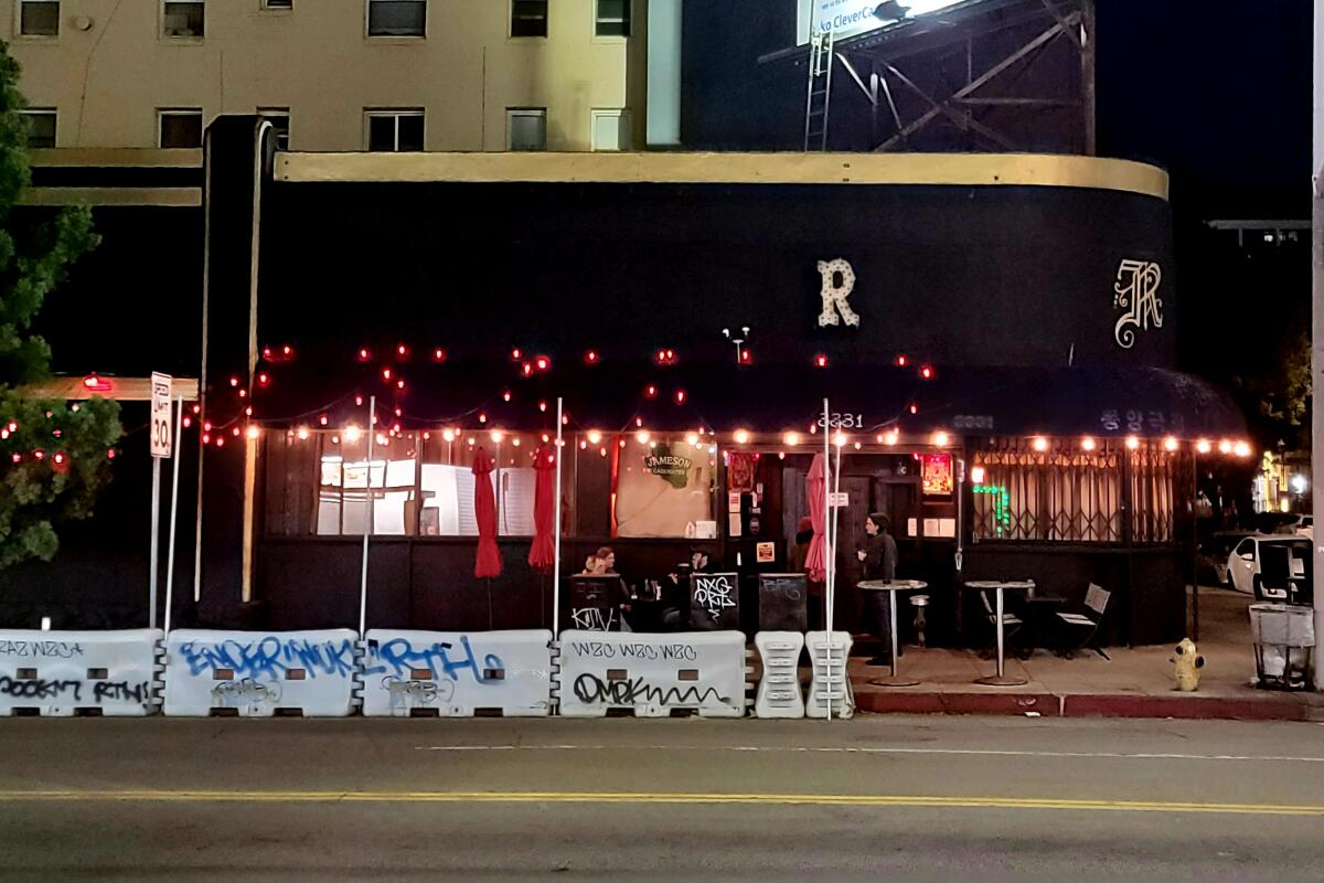R Bar's curved corner marquee.