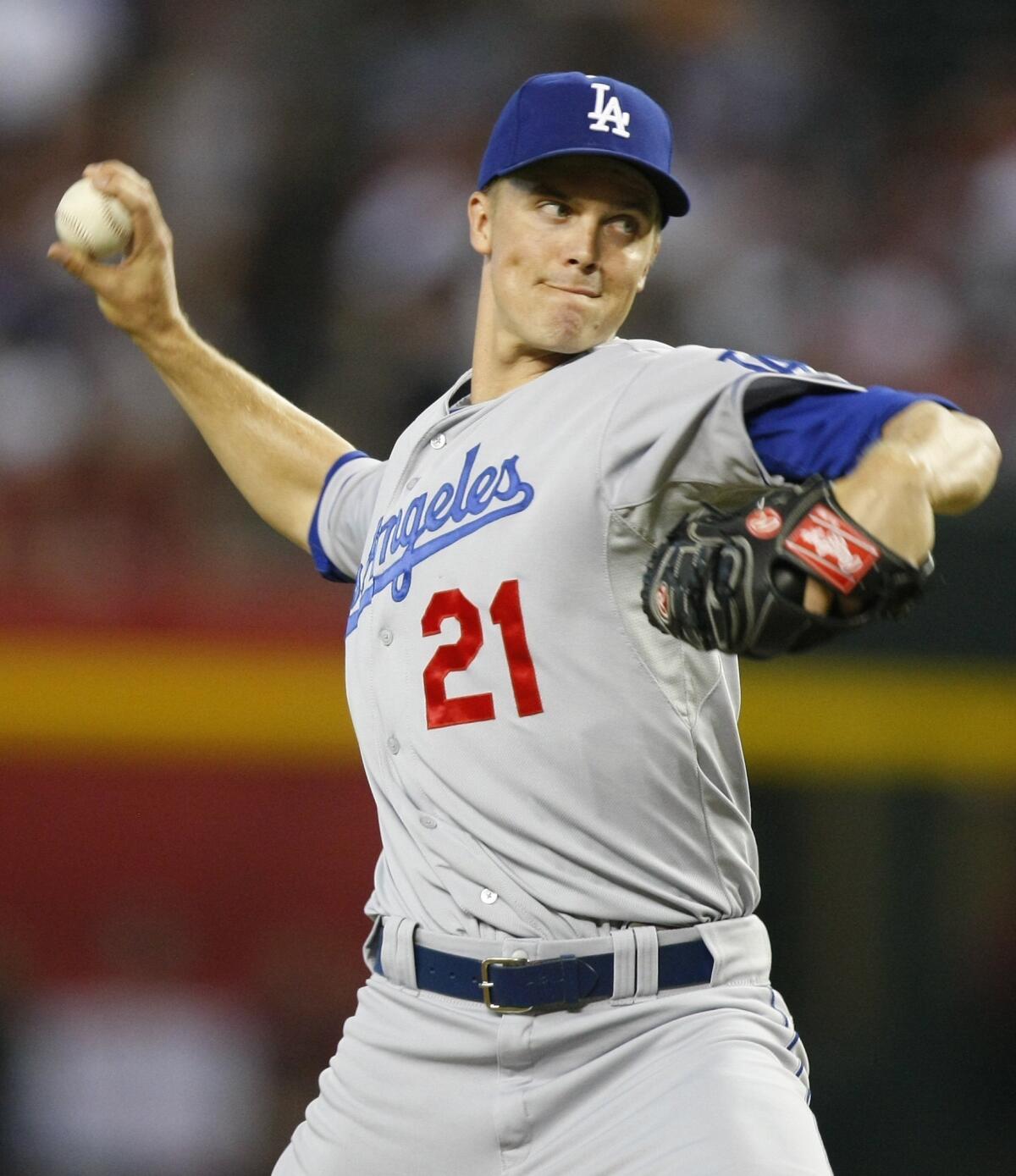 Dodgers starter Zack Greinke delivers a pitch during the first inning of Monday's 6-1 victory over the Arizona Diamondbacks.