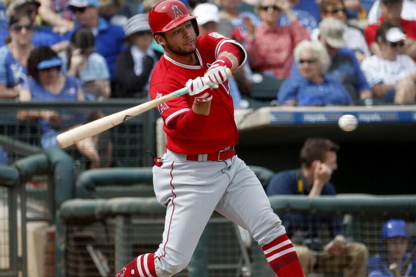 Los Angeles Angels' David Fletcher hits against the Kansas City Royals during the first inning of a spring training baseball game, Thursday, March 7, 2019, in Surprise, Ariz. (AP Photo/Matt York)