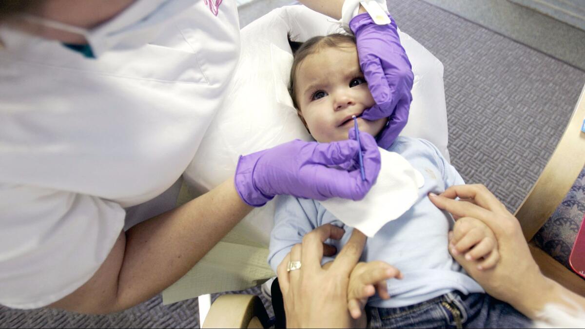 One of the problems with giving juice to infants and toddlers is the risk of tooth decay. (Jill Torrance / Associated Press)