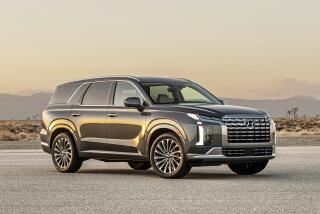 This photo provided by Hyundai shows the 2023 Hyundai Palisade a midsize three-row SUV. Both the Palisade and its corporate cousin, the Kia Telluride, are top picks in this class. (Courtesy of Hyundai Motor America via AP)