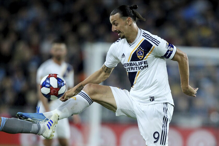 Galaxy midfielder Zlatan Ibrahimovic kicks the ball against the Minnesota United during the first half of an MLS first-round playoff match on Oct. 20 in St. Paul, Minn.